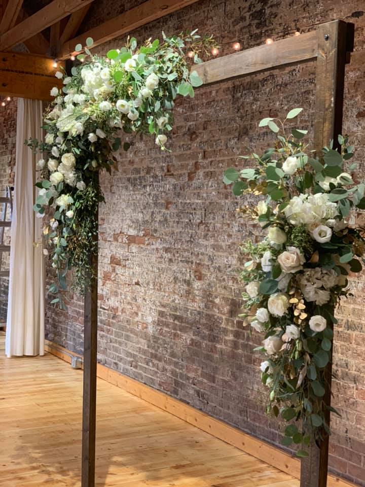 White & gold floral arch swags